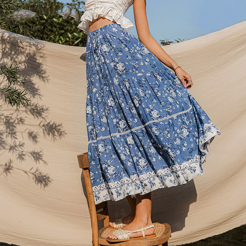 Damesrok met bloemenprint en vloeiende snit - Evi