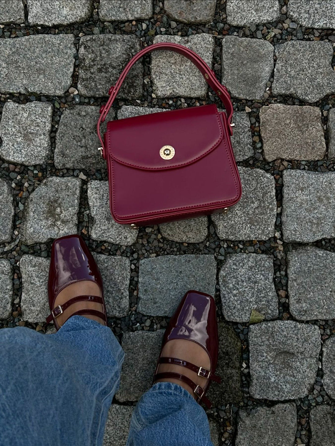 Dameshandtas met klep en elegante afwerking