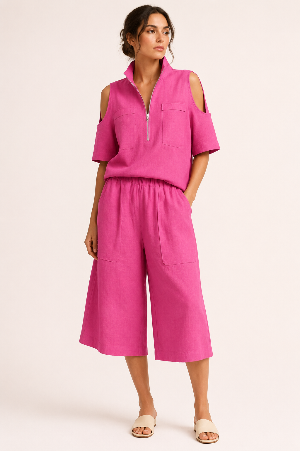Damesoutfit bestaande uit een blouse met open schouders en een wijde broek - Irmela