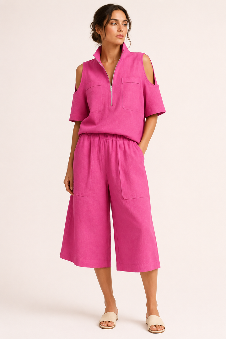 Damesoutfit bestaande uit een blouse met open schouders en een wijde broek - Irmela