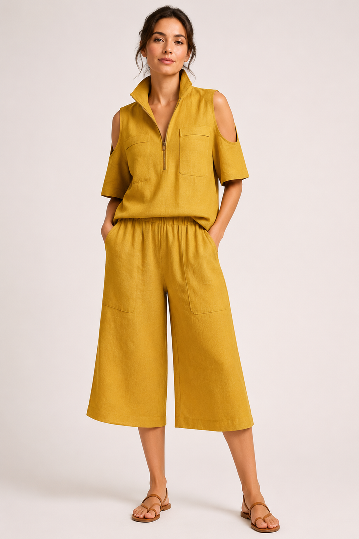 Damesoutfit bestaande uit een blouse met open schouders en een wijde broek - Irmela