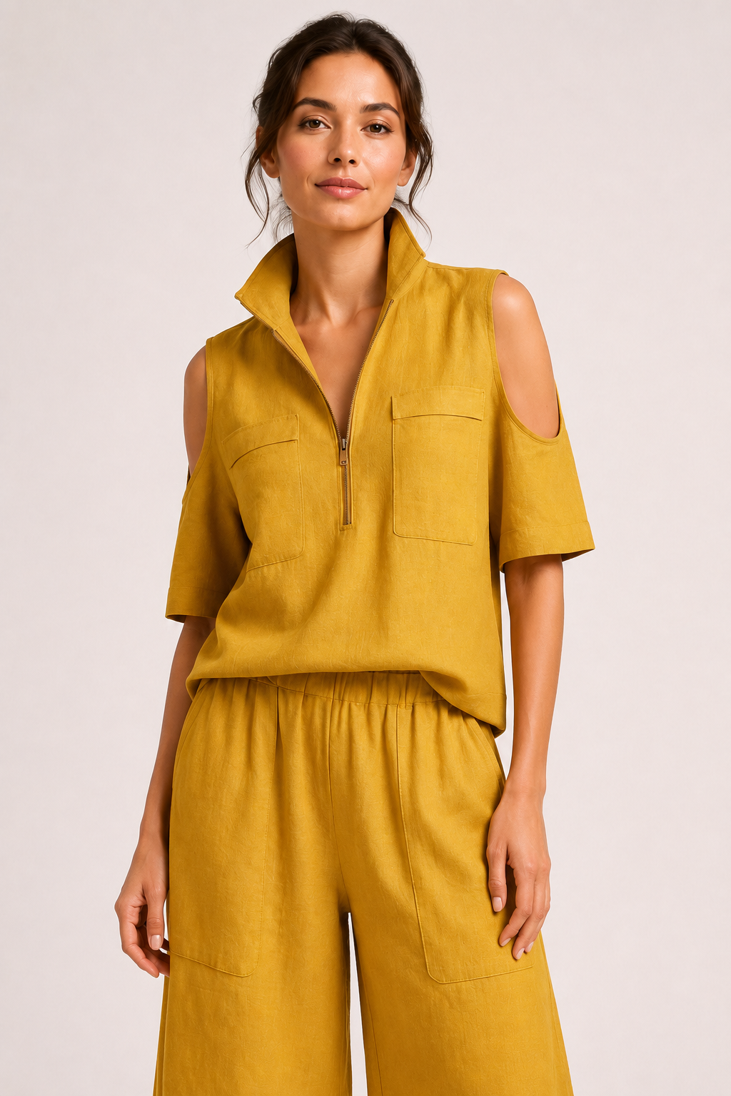 Damesoutfit bestaande uit een blouse met open schouders en een wijde broek - Irmela