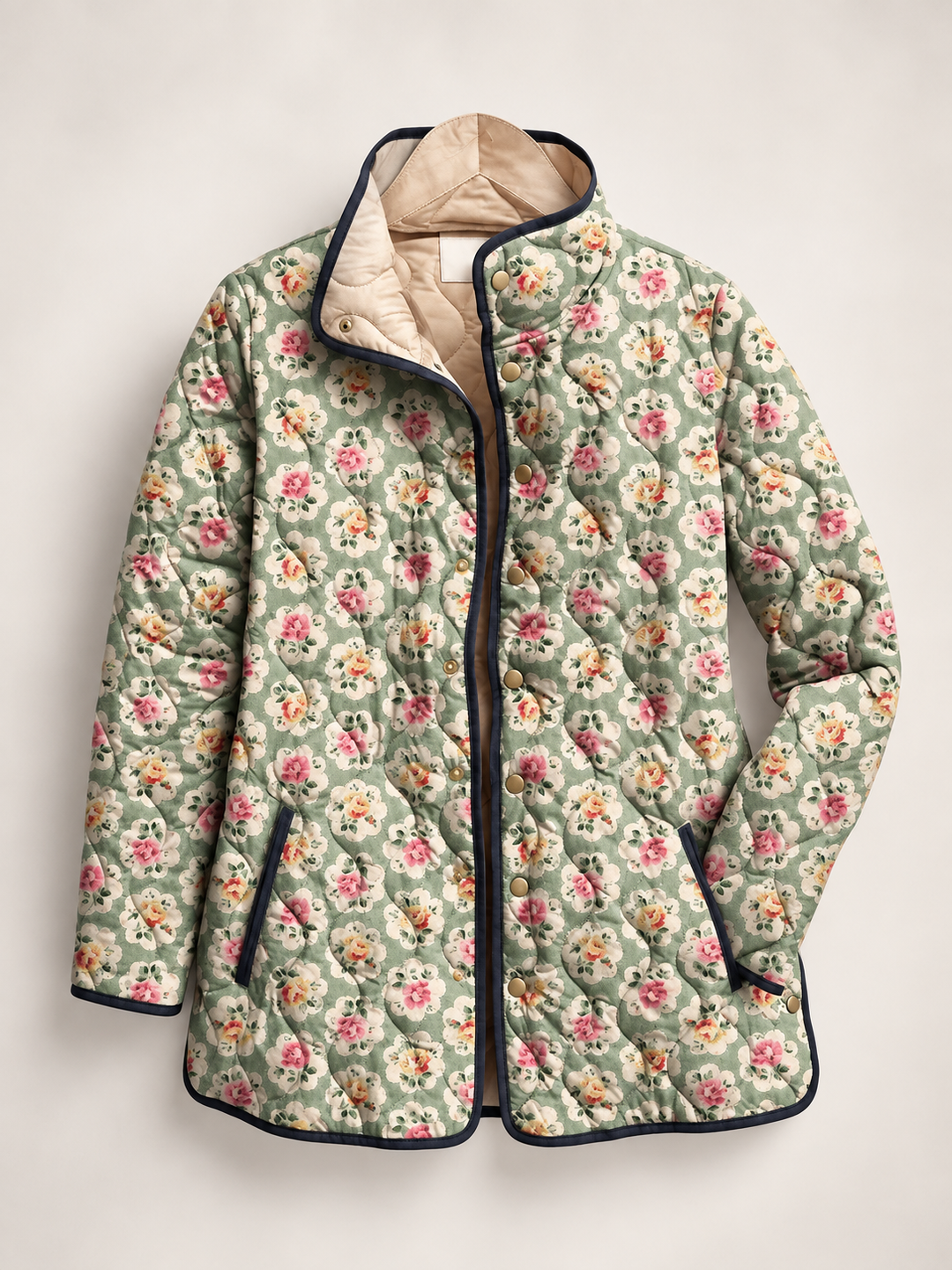 Gewatteerd damesjack met bloemenprint en contrasterende biezen - Lainey