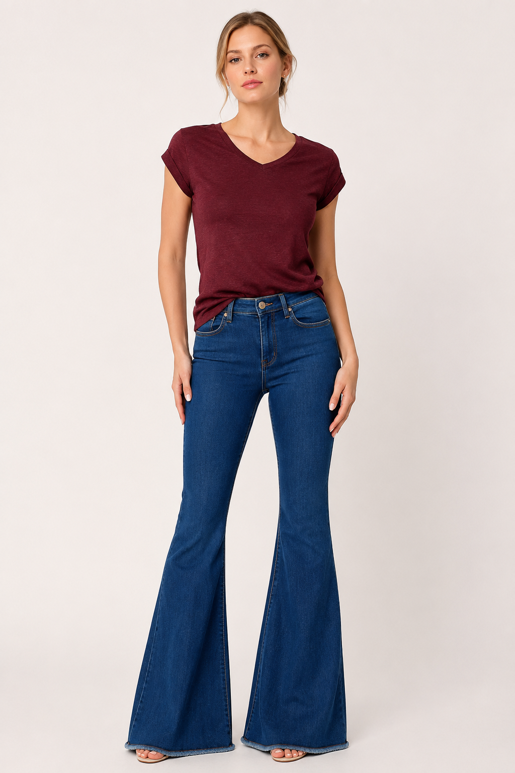 Damesjeans met hoge taille en uitlopende pijpen en gerafelde zoom - Anika