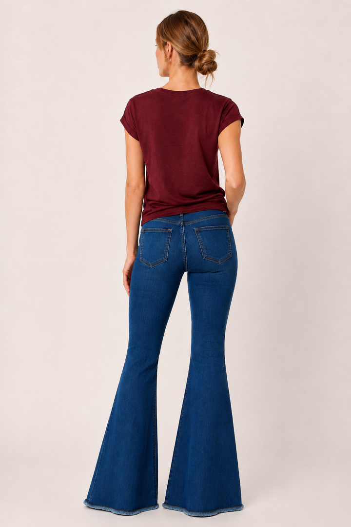Damesjeans met hoge taille en uitlopende pijpen en gerafelde zoom - Anika