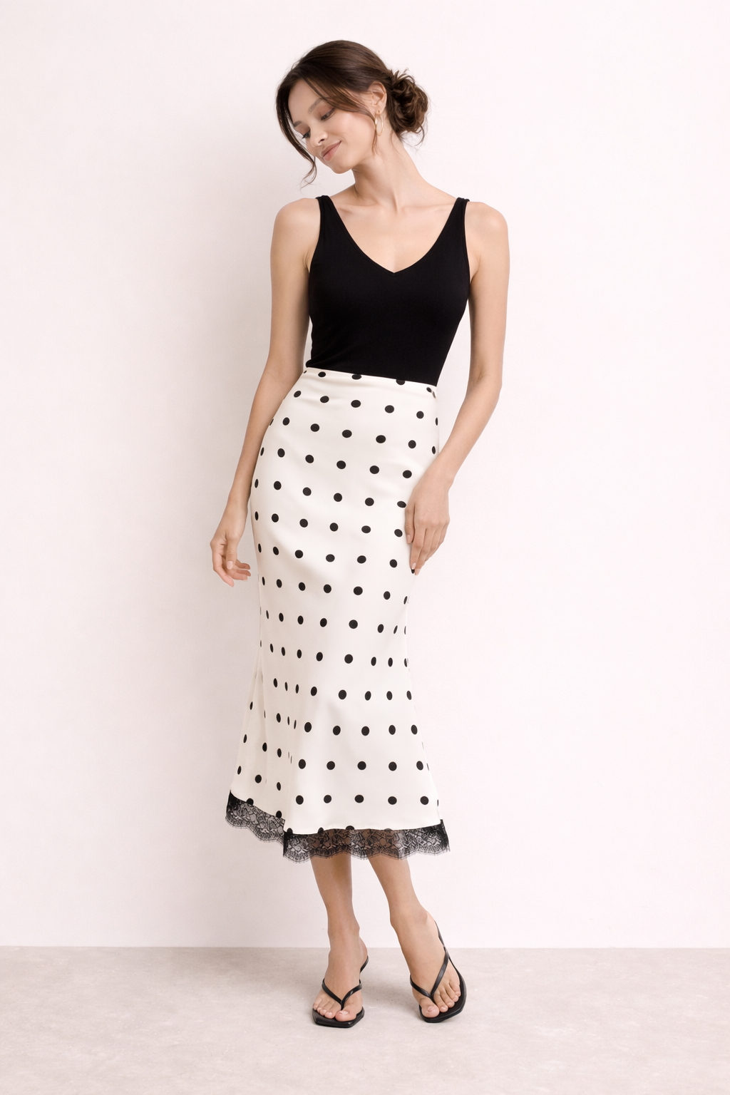 Dames midirok met stippenprint en elegant kanten detail - Solenne