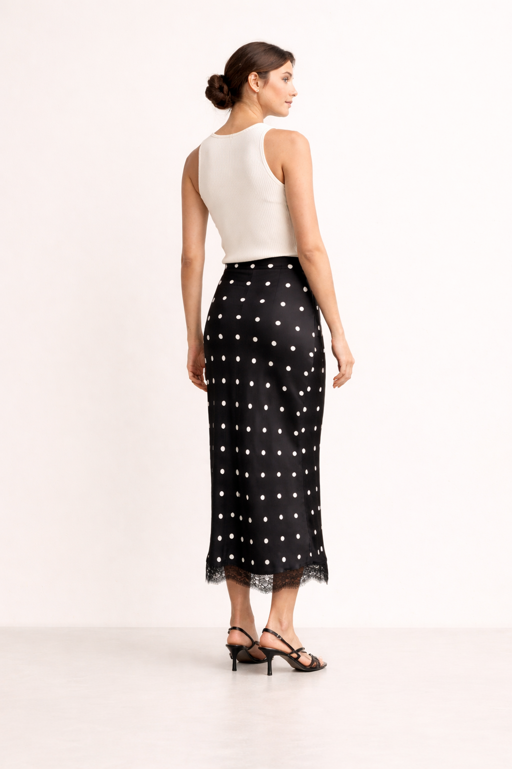 Dames midirok met stippenprint en elegant kanten detail - Solenne