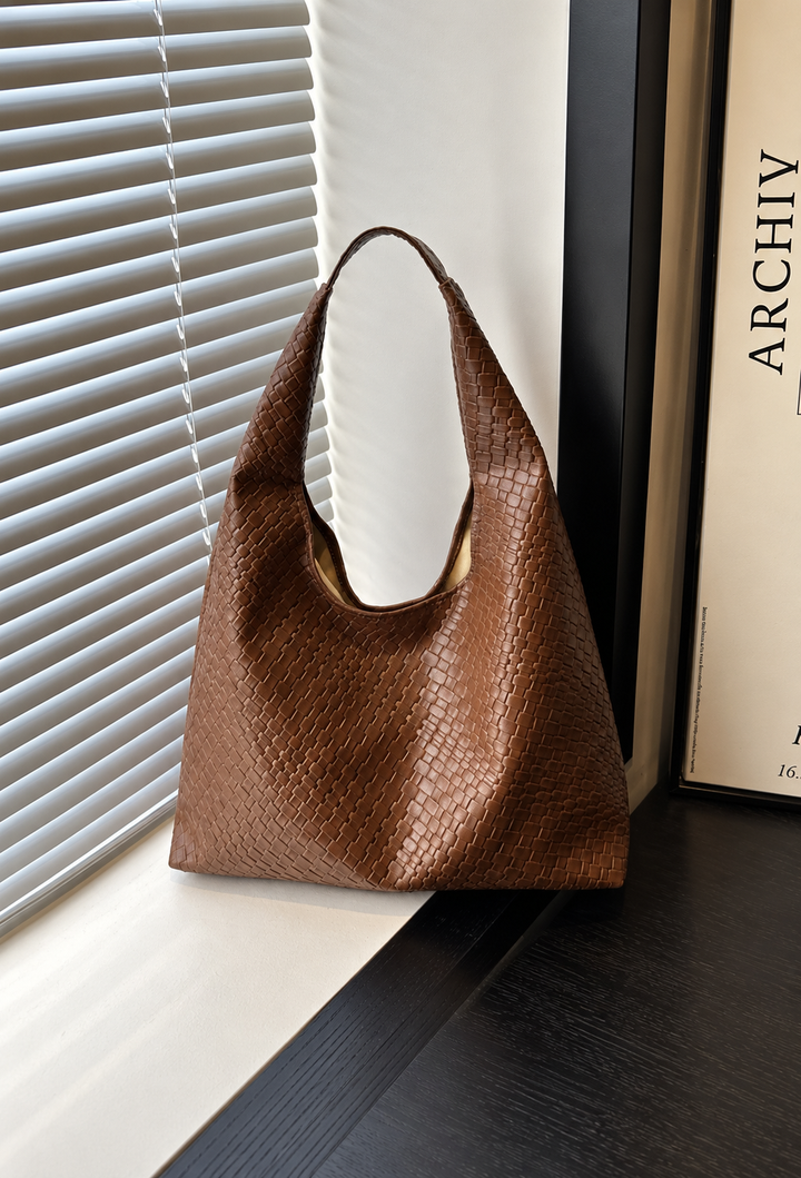 Damesschoudertas in leerlook met gevlochten afwerking hobo - Apolline