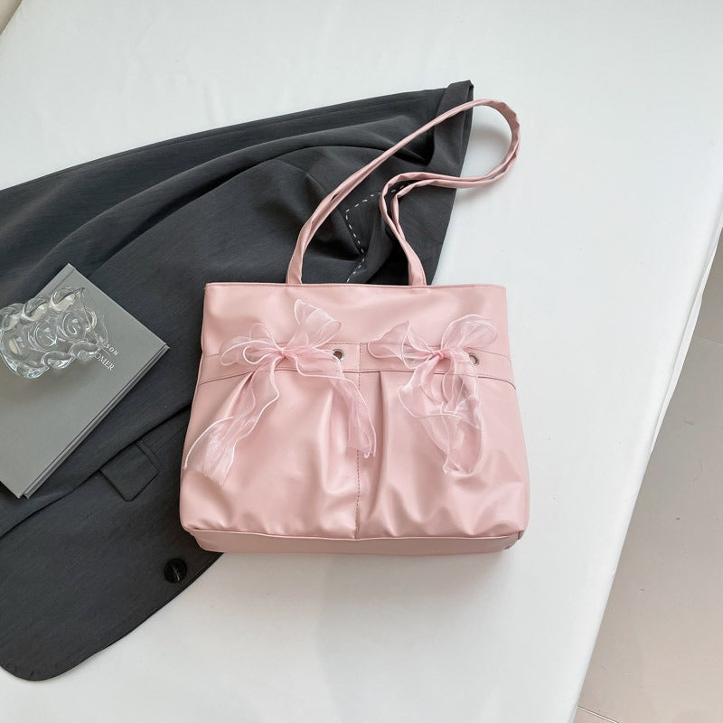 Damestas met decoratieve strikken universiteitsstijl - Amelia