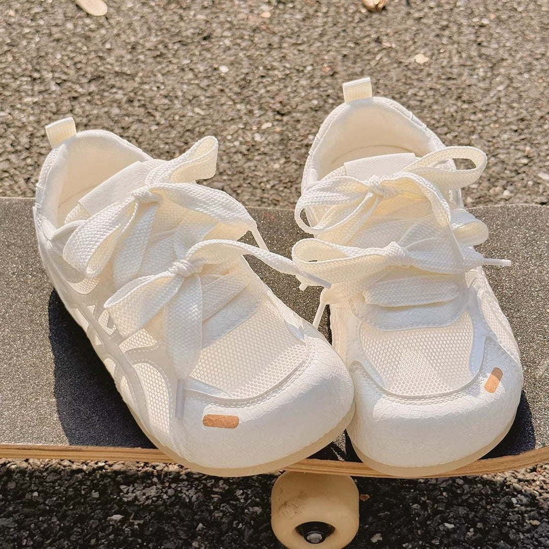 Dames sneakers met kruisband - Alana
