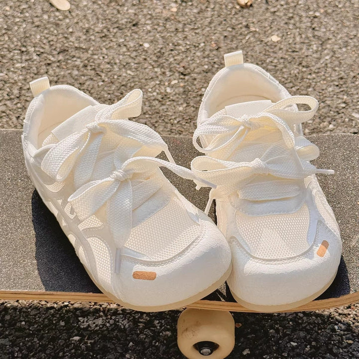 Dames sneakers met kruisband - Alana