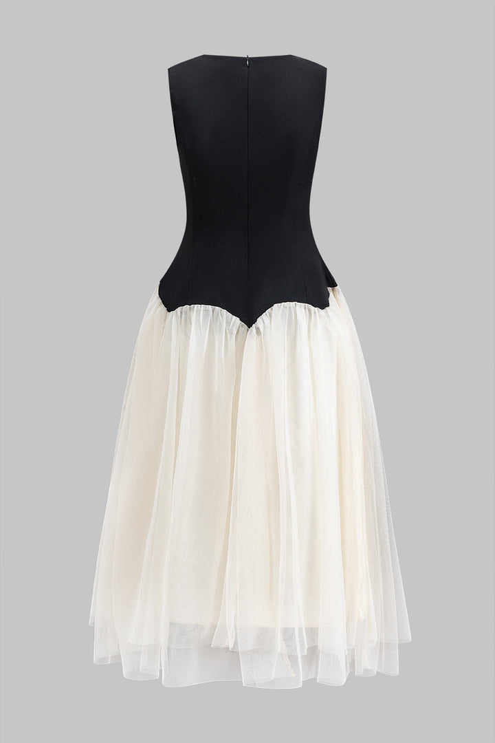 Vera - Mouwloze midi-jurk met rits en ruches