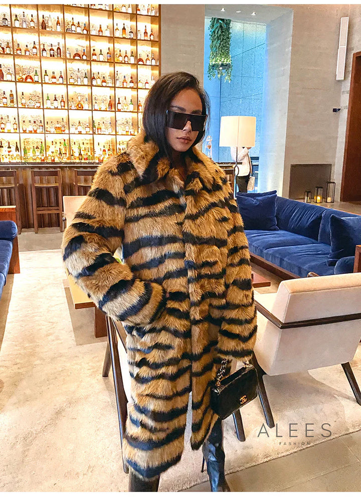 Lange damesjas met imitatiebonteffect en dierenprint - Brisa