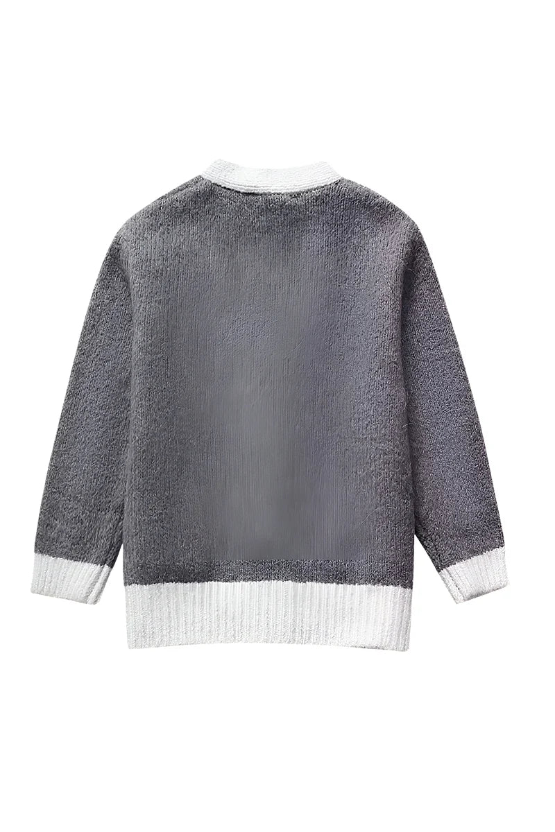 Damesvest met V-hals en knopen met contrasterende details - Elva
