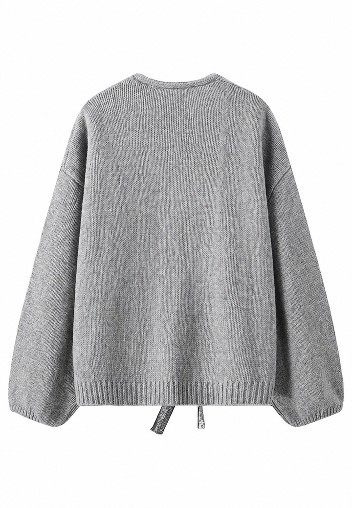 Damesvest met glinsterende strikjes en V-hals - Coronas