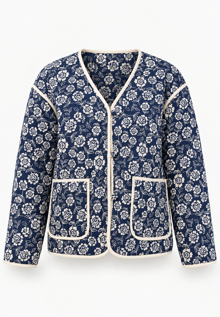 Gewatteerd damesjasje met bloemenprint en contrastbiezen - Mireva