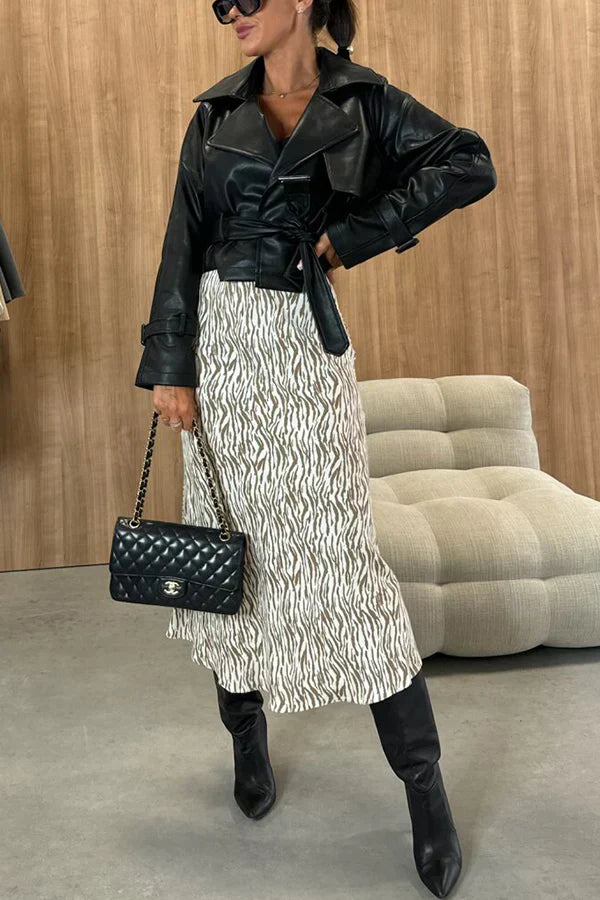 Afslankende rok met hoge taille en gedurfde en chique dierenprint, perfect voor een gedurfde en modieuze look