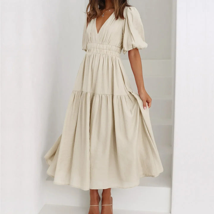 Kelly - Elegante jurk met V-hals en pofmouwen