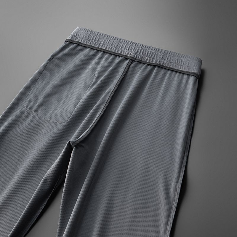 Heren sportbroek met geborduurde zak - André