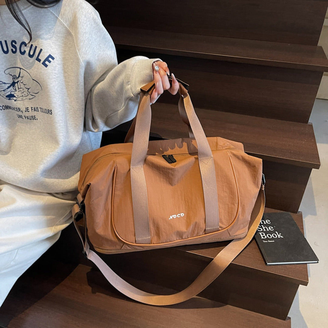 Schoudertas voor dames van sportieve en duurzame stof - Miranda