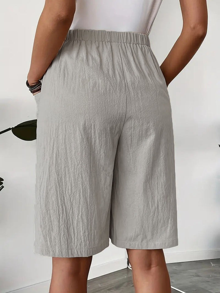 Damesrok in gestructureerd katoen, recht model met zakken - Maëlle