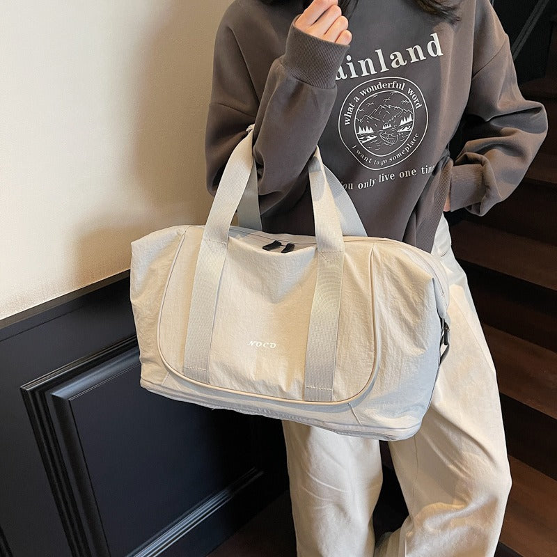 Schoudertas voor dames van sportieve en duurzame stof - Miranda