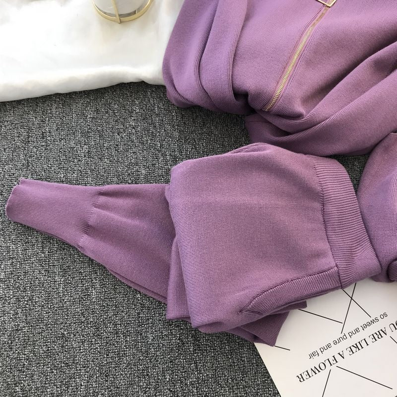 Gebreide damesjas met metalen ritssluiting ronde hals - Nysse