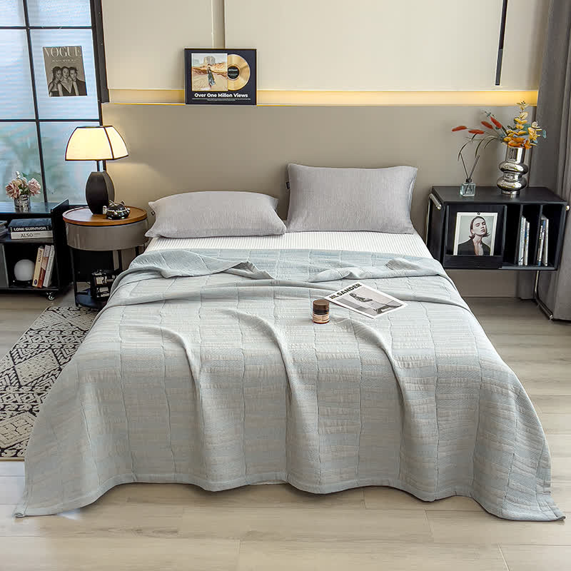 Gestreepte katoenen mousseline sprei
